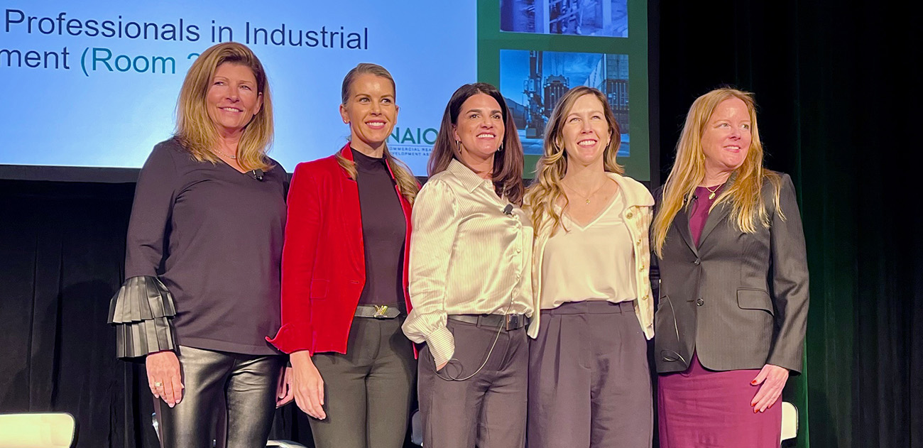 Industrial commercial real estate professionals pose after NAIOP ICON West panel